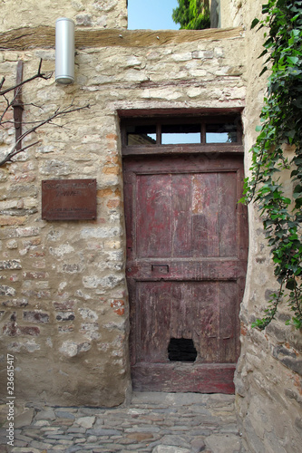 Old doorway in Monforte d'Alba, a town in the Piemonte wine region of northern Italy.