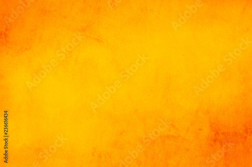 Fototapeta Horyzontalny żółty i pomarańczowy grunge tekstury cementu lub betonowej ściany sztandar, pusty tło