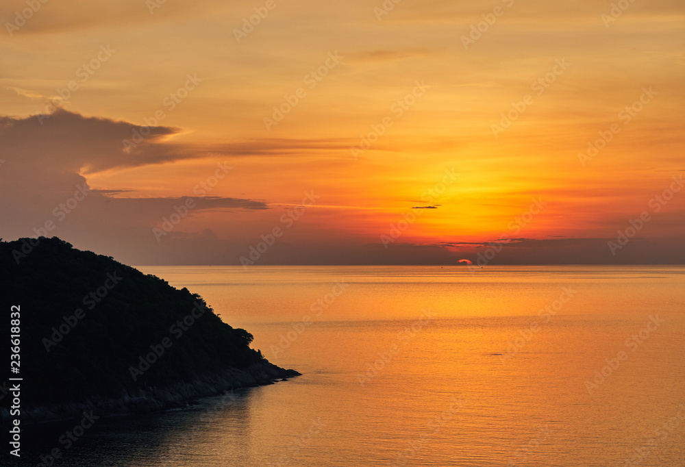  Spectacular sunset over sea lagoon and island
