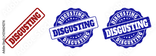 DISGUSTING scratched stamp seals in red and blue colors. Vector DISGUSTING labels with grainy texture. Graphic elements are rounded rectangles, rosettes, circles and text labels.