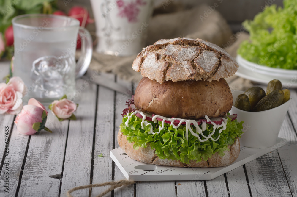 Portobello burger, homemade bun and lettuce Portobello burger, homemade bun and lettuce