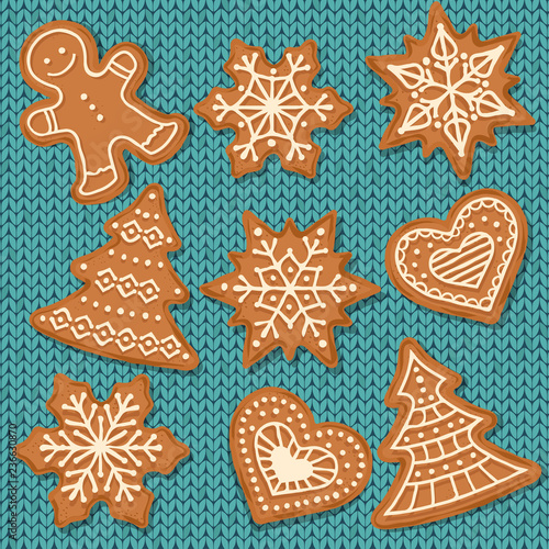 Cute gingerbread elements isolated on knitted  background