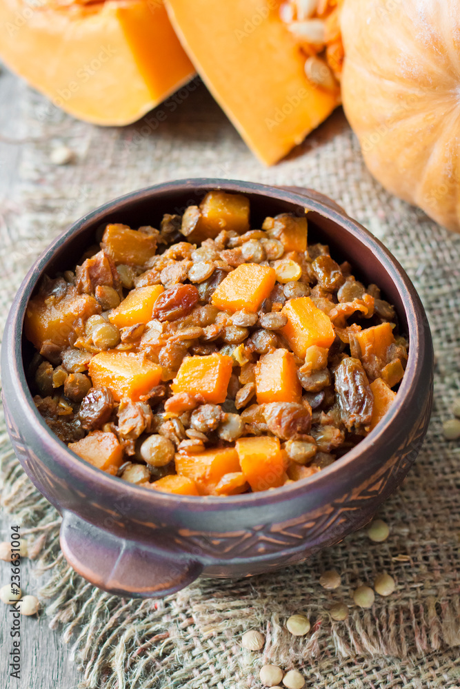 Spicy curry with green lentils, pumpkin and raisins Spicy curry with green lentils, pumpkin and raisins