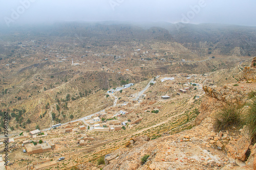 Mountain village in the fog. View of the town from above. Tunisia © Ruslan Grebeshkov
