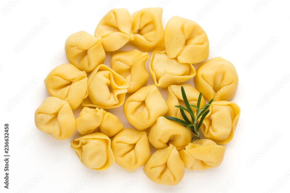 Raw homemade pasta,tortellini with herbs. Raw homemade pasta,tortellini with herbs.