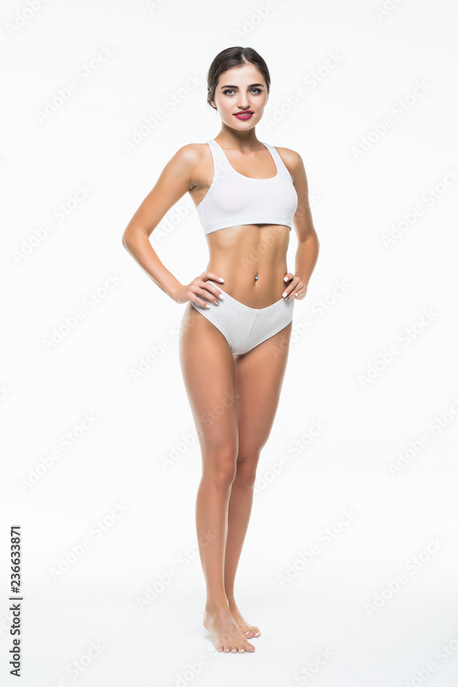 Full length portrait of happy young woman in lingerie isolated on white background Full length portrait of happy young woman in lingerie isolated on white background