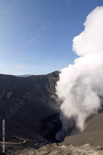 smoke coming out of the bromo volcano caldera