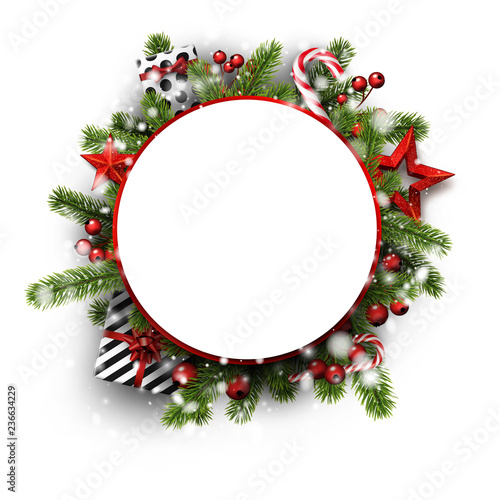 Christmas and New Year round card with fir branches, holly berries and holiday decorations.