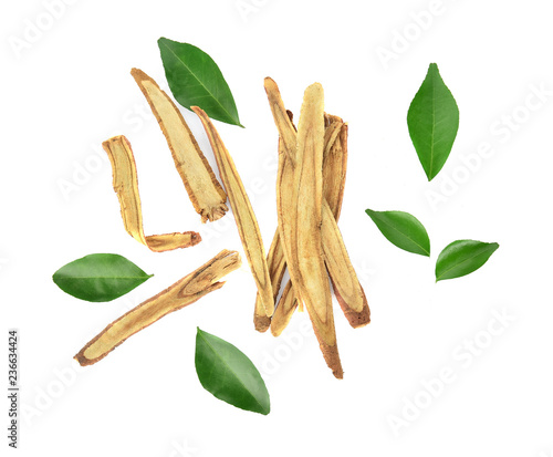 Top view of Slice Licorice roots on white background photo