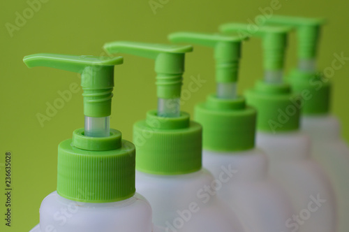 set of green plastic bottles