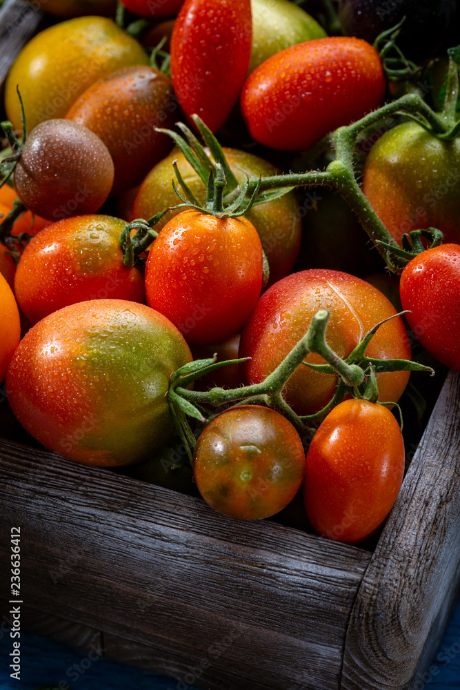 Fresh Heirloom tomatoes in crate