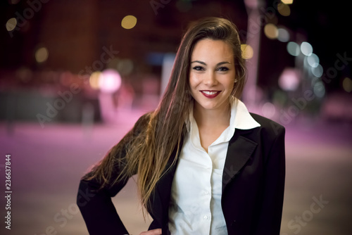 Business woman portrait at night