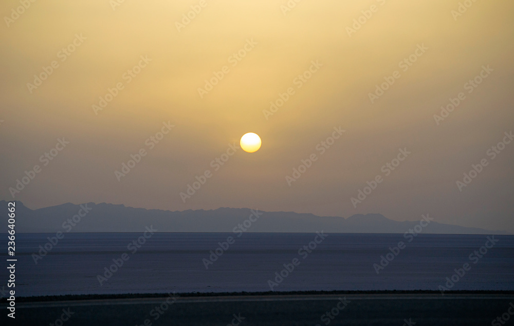 Dawn in the desert. Salt lake. Sunrise. Tunisia