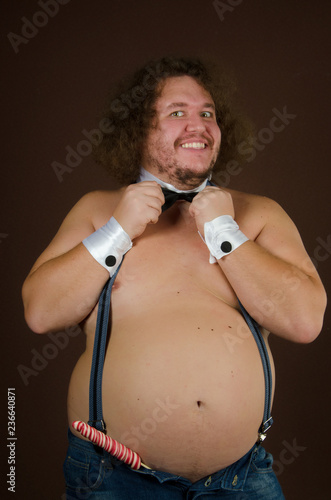 Funny sexy bodybuilder. Fat man. Stock Photo | Adobe Stock