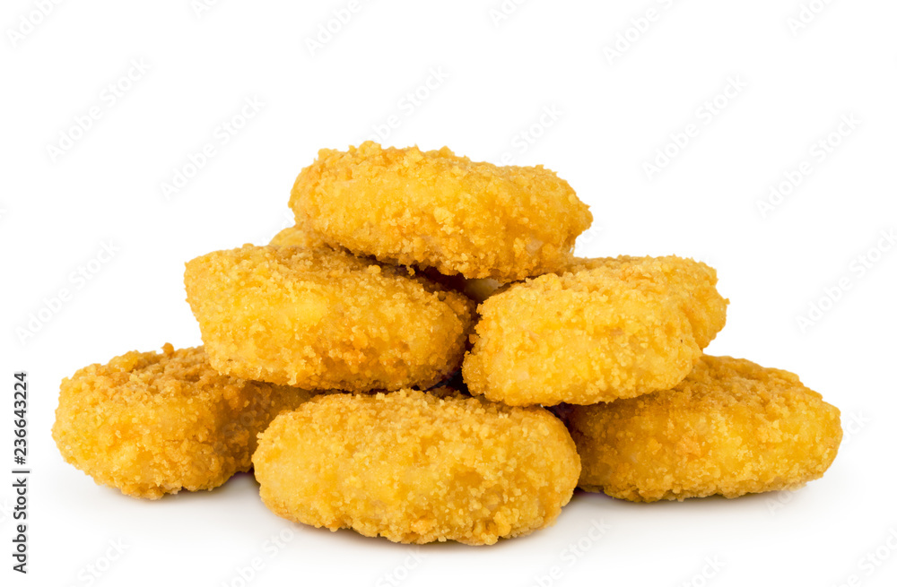 Heap of chicken nuggets close up on a white. Isolated. Heap of chicken nuggets close up on a white. Isolated.