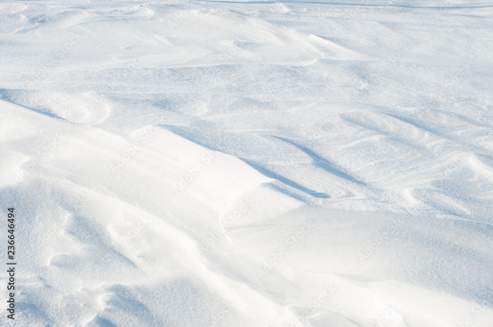 Wind sculpted patterns on snow surface. Wind sculpted patterns on snow surface.