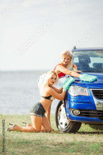 two hot girls wash the car