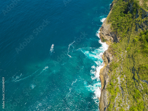 Aerial view of the ocean cliff near Kelingking beach located on the island of Nusa Penida, Indonesia