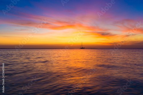 Sunset on ocean in Zanzibar © Pakhnyushchyy