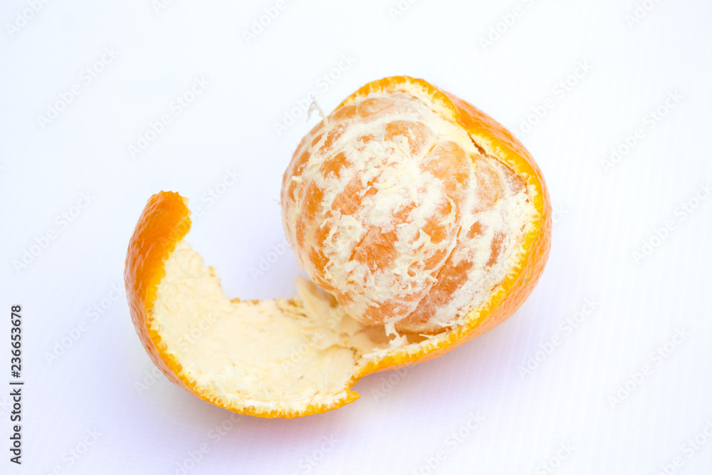 Peeled mandarin, mandarin on a white background Peeled mandarin, mandarin on a white background