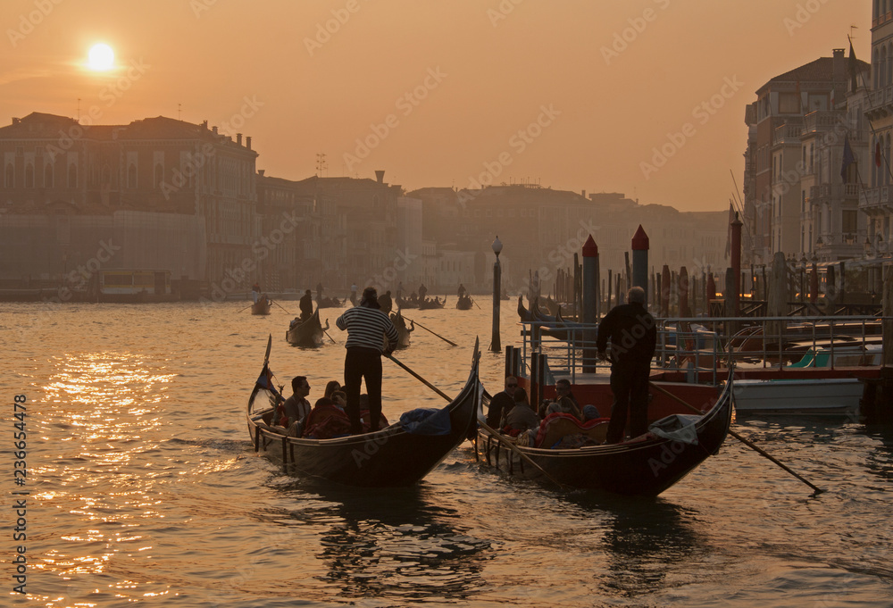 Three gondolas on the Grand canal of Venice