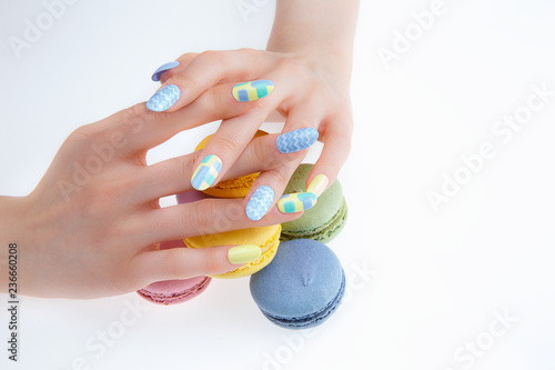 a woman s nail  designed with nail art