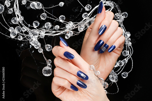 a woman's nail, designed with nail art