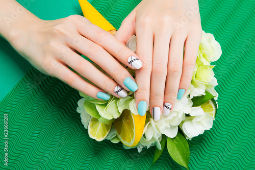 a woman's nail, designed with nail art