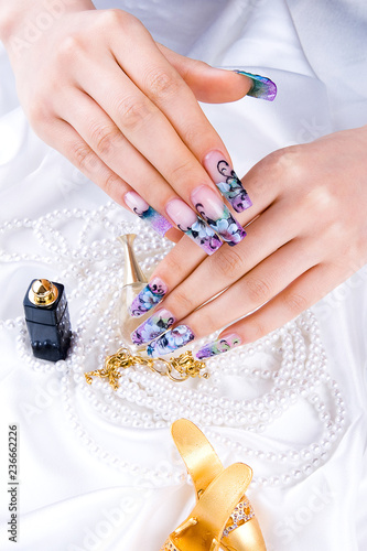 a woman's nail, designed with nail art