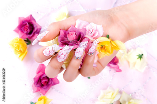 a woman's nail, designed with nail art