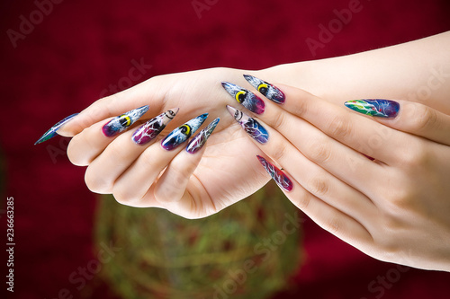 a woman's nail, designed with nail art