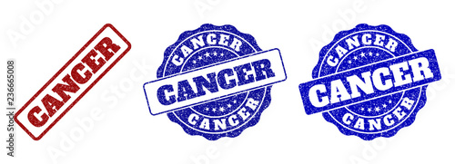 CANCER grunge stamp seals in red and blue colors. Vector CANCER overlays with grunge texture. Graphic elements are rounded rectangles, rosettes, circles and text labels.