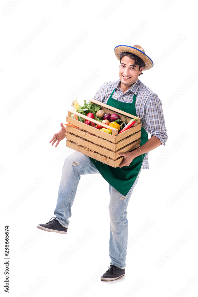 Young farmer with fresh produce isolated on white background Young farmer with fresh produce isolated on white background