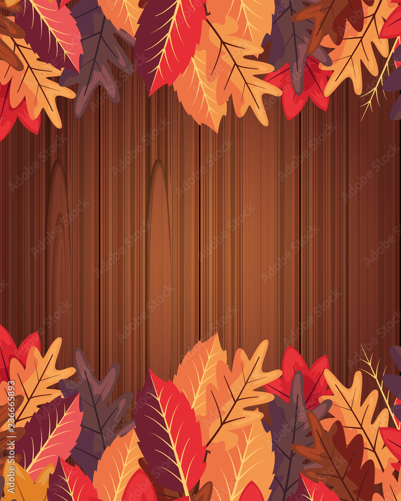 Obraz premium autumn leaves foliage on wooden background