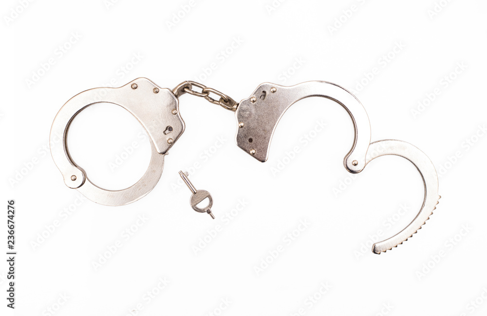 isolated metal handcuffs isolated metal handcuffs