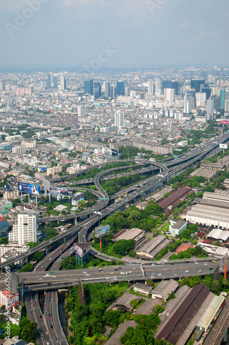 Fototapeta Naklejka Na Ścianę i Meble -  Aerial view on modern buildings and highway road