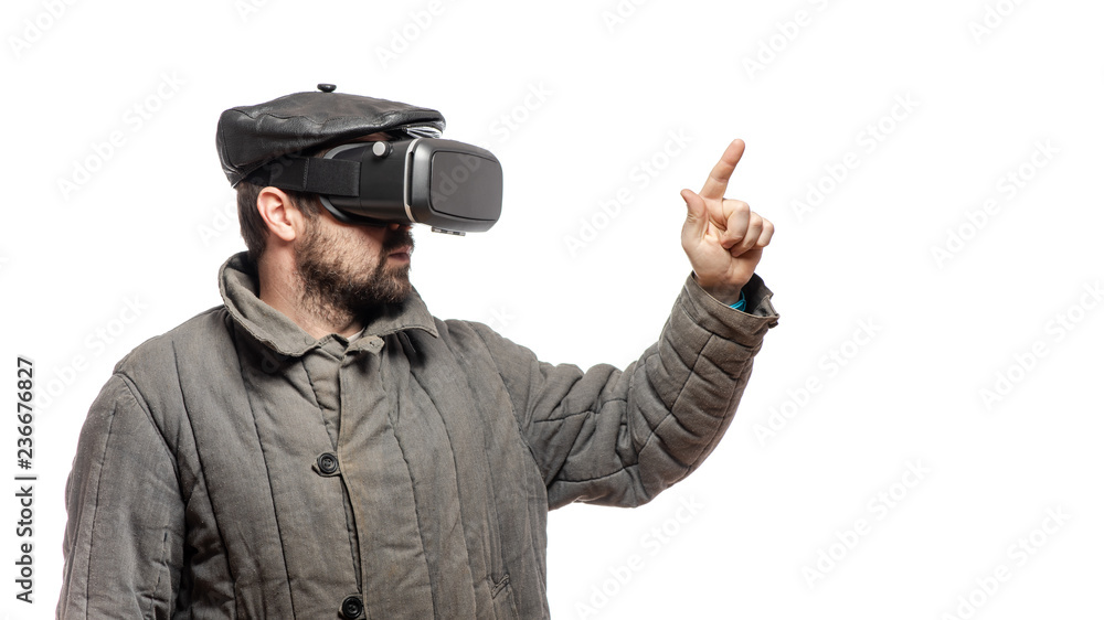 Old fashioned man immersed in virtual reality headset, studio shot, banner with copy space Old fashioned man immersed in virtual reality headset, studio shot, banner with copy space