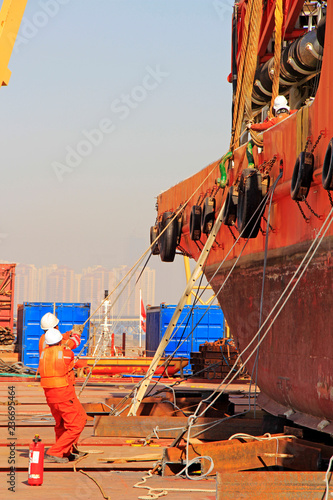 workers were bound and fixed the ship in tianjin port, tianjin, China. photo