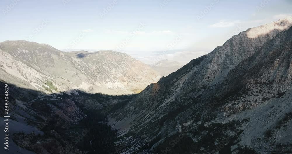 Epic aerial background shot of beautiful massive big rocky mountain ridge in Yosemite national park, California USA. Epic aerial background shot of beautiful massive big rocky mountain ridge in Yosemite national park, California USA.