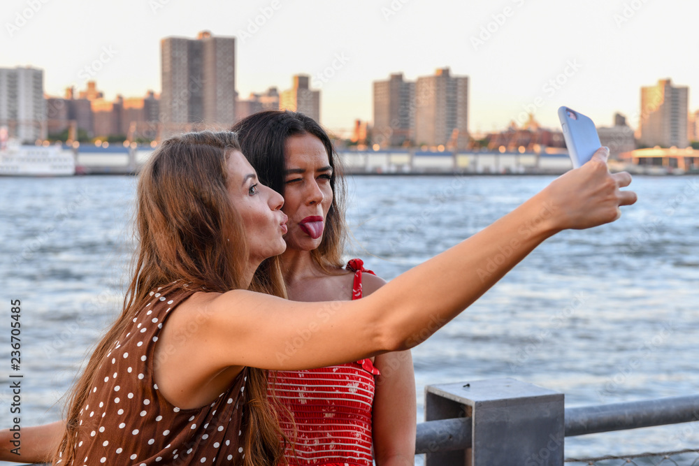 Girls Interacting with Phone Girls Interacting with Phone