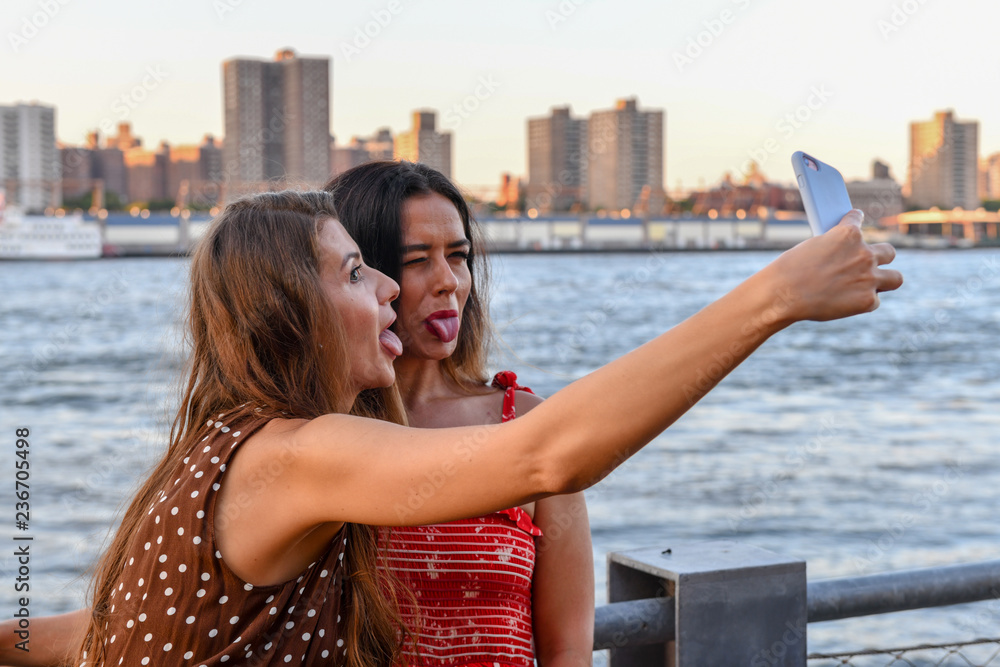 Girls Interacting with Phone Girls Interacting with Phone