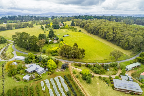 Fototapeta Naklejka Na Ścianę i Meble -  Aerial view of agricultural land and trees in Melbourne, Australia
