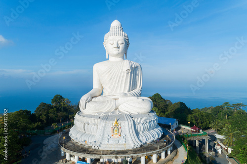 Big buddha over high mountain in Phuket thailand Aerial view drone shot