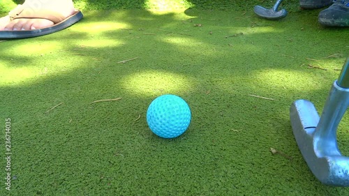 close up on a minigolfball when putting photo