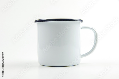 White tin cup.