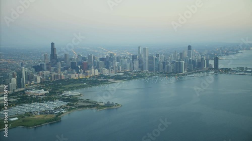 Wallpaper Mural Aerial sunrise illuminated view of Chicago Illinois the Windy City Metropolitan skyline city Skyscraper buildings Waterfront marina USA  Torontodigital.ca