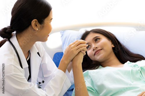medical doctor hold patient hand