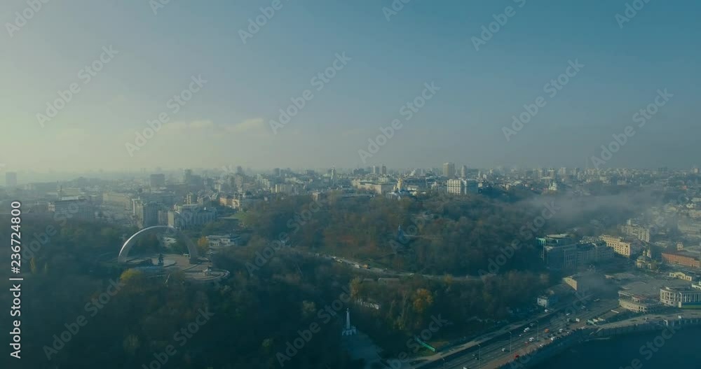 Aerial Drone view city and bridges in the misty foggy hazy morning.Foggy weather over pedestrian bridge.Smog and air pollution on a hazy day.Scenic foggy weather. city sunrise fog. Aerial Drone view city and bridges in the misty foggy hazy morning.Foggy weather over pedestrian bridge.Smog and air pollution on a hazy day.Scenic foggy weather. city sunrise fog.