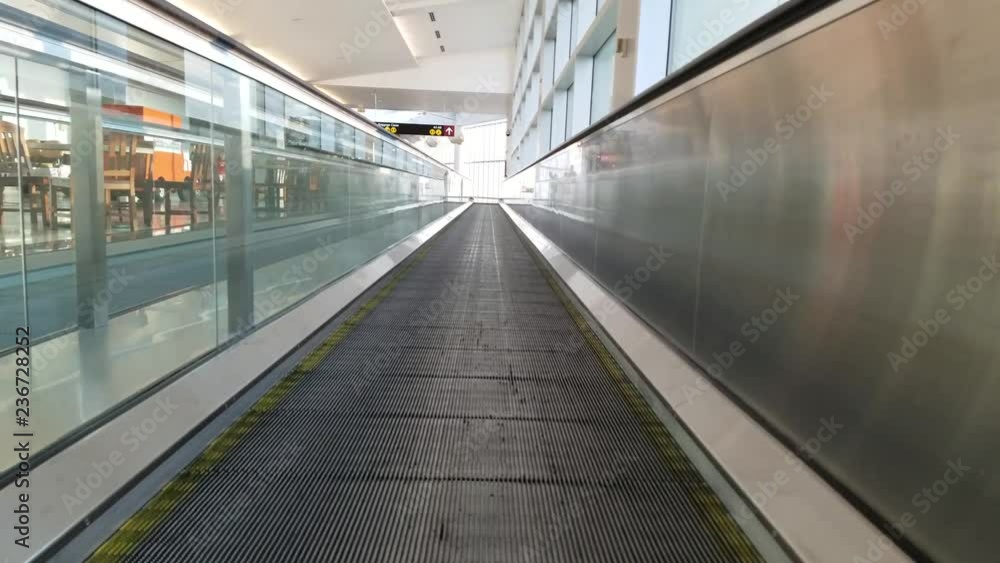 Moving walkway/ sidewalk/skywalk/ horizontal escalator in airport Moving walkway/ sidewalk/skywalk/ horizontal escalator in airport