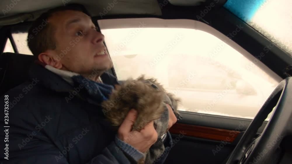 Man in car yells, beats hands on wheel, crazy, Man in car yells, beats hands on wheel, crazy,